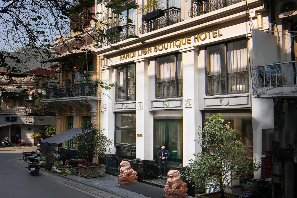 Watch Hanoi glow from your hostel perch